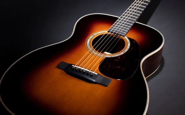 Guitarra Martin 000-28 Modern Deluxe con el tratamiento Vintage Tone System.